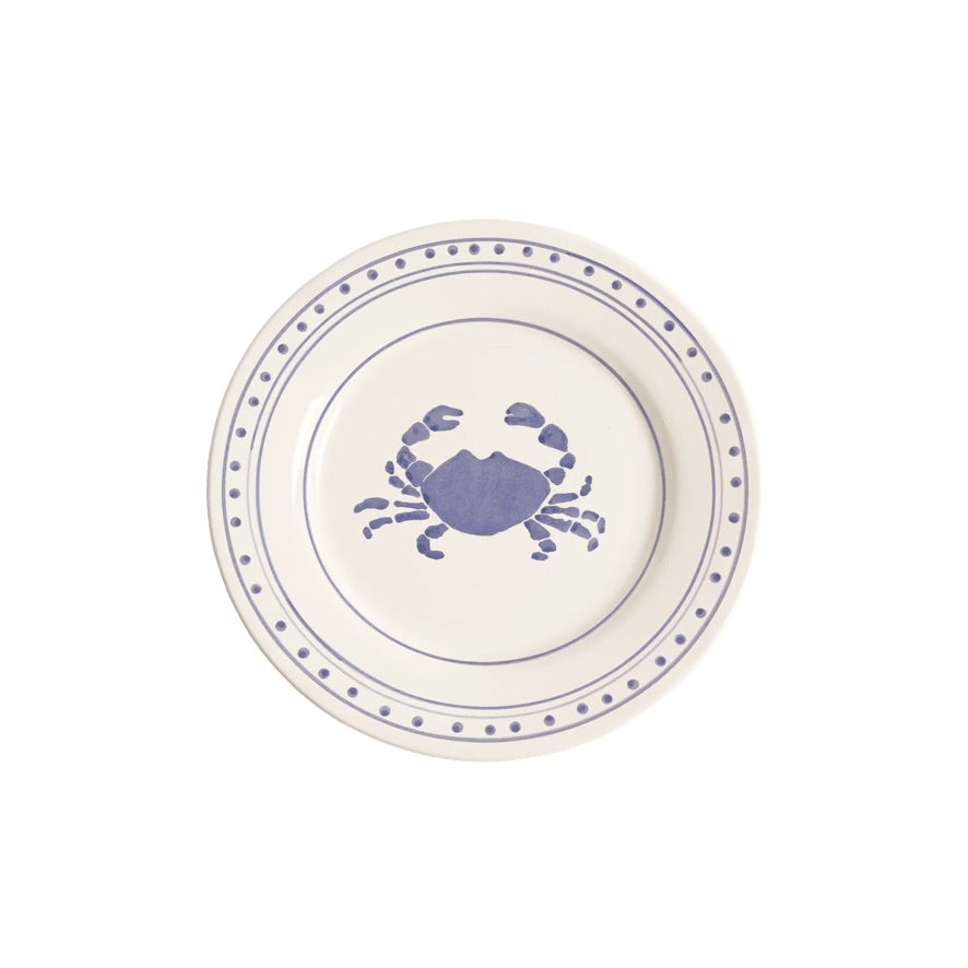 Vacker tallrik med blått krabbmotiv