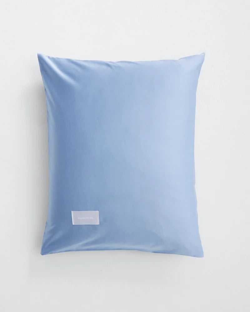 Ljusblåa sängkläder örngott