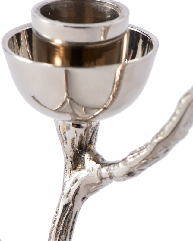 Silvrig ljusstake från märket Twiggy