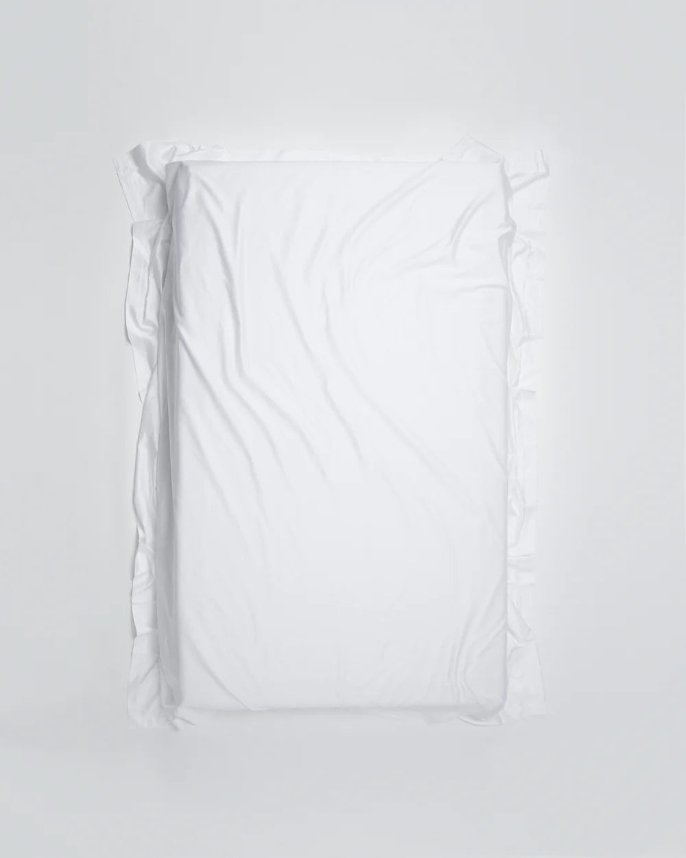 Underlakan i vit bomull